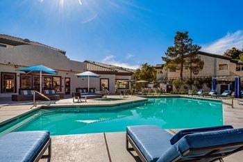Lushly landscaped resort-inspired pool & spa with private cabanas